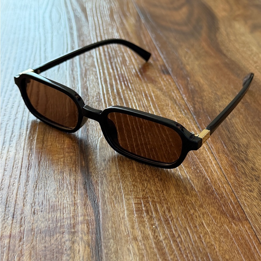 Chic Black Sunglasses with Gold Accents